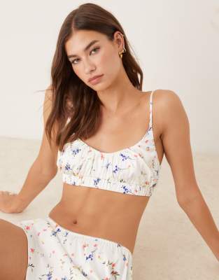 ASOS DESIGN - Satin-Pyjama mit Blümchenmuster, aus Bustier und Shorts-Bunt