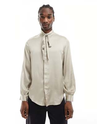 ASOS DESIGN satin shirt with tie neck and blouson volume sleeve in champagne-Neutral