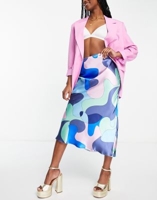 ASOS DESIGN satin slip midi skirt in swirl print