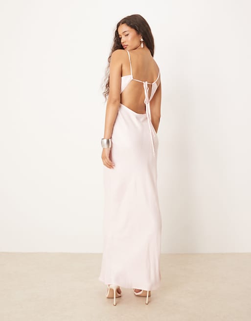 satin light pink dress Zya Maxi - 10 Lightweight satin material Little to no stretch Fully lined Adjustable spaghetti straps Bowtie feature at straps Maxi length Invisible side zip Body Jasmine Halter Maxi Dress, in