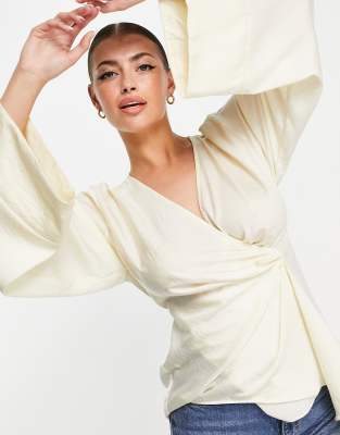 ASOS DESIGN satin twist front blouse with flared sleeve in cream-White