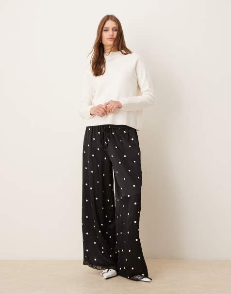 ASOS DESIGN satin wide leg pants with lace trim in black polka dot - view 1