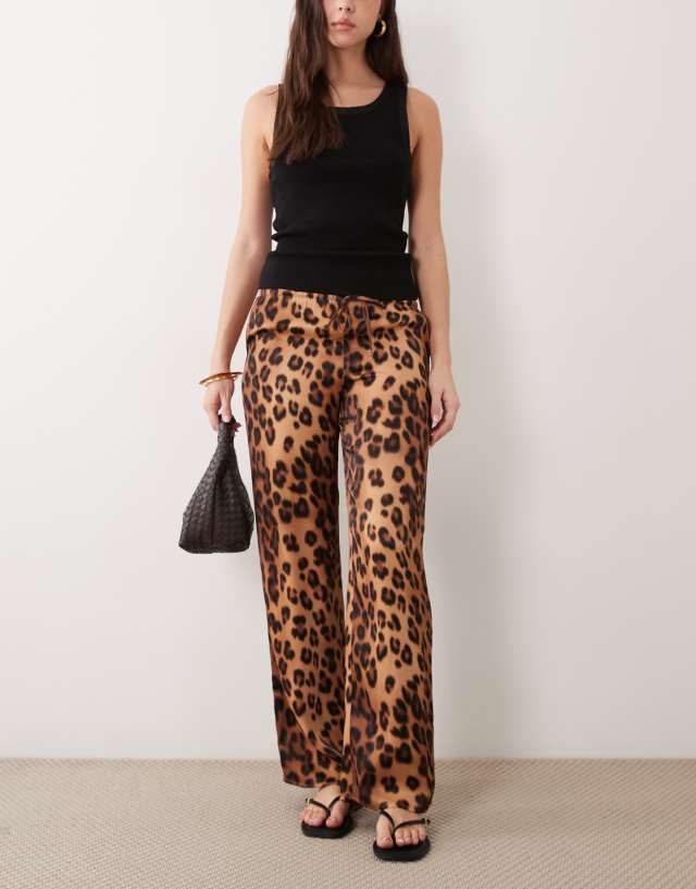 ASOS DESIGN satin wide leg pull on pants in leopard print | ASOS