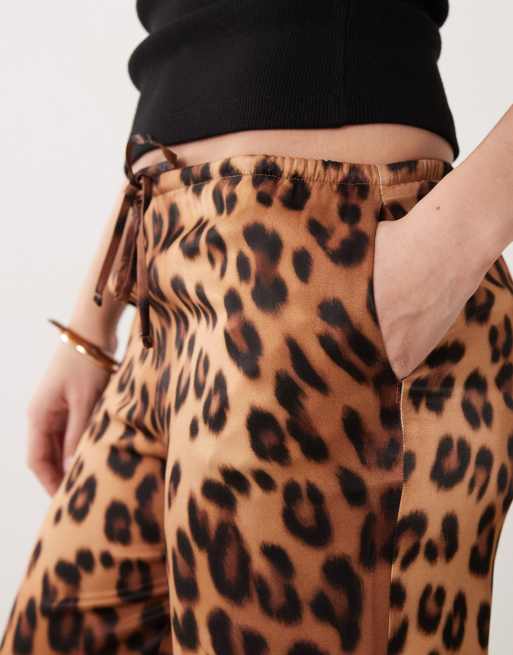 ASOS DESIGN satin wide leg pull on pants in leopard print | ASOS