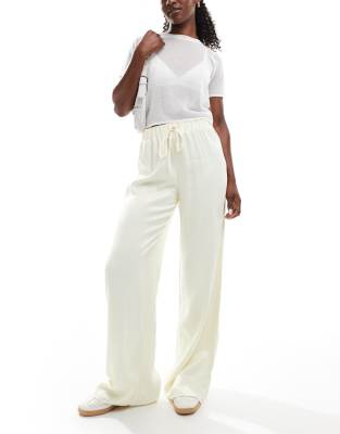 ASOS DESIGN satin wide leg trouser in lemon-Yellow