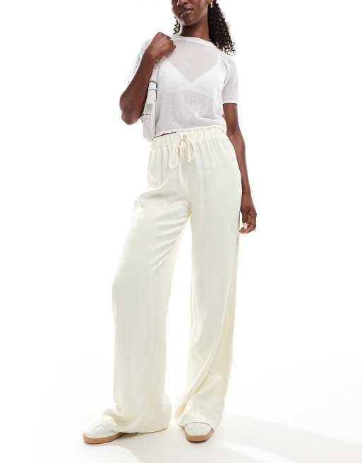 ASOS DESIGN – Satinhose in Zitronengelb mit weitem Bein