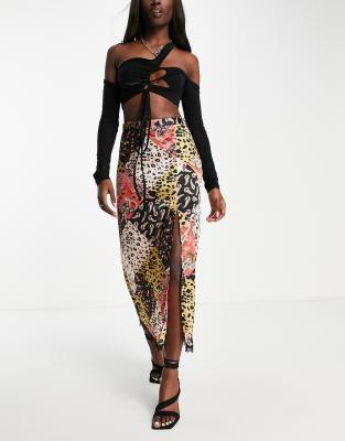 ASOS DESIGN – Satynowa marszczona spódnica w patchworkowy wzór z koronkowym wykończeniem 