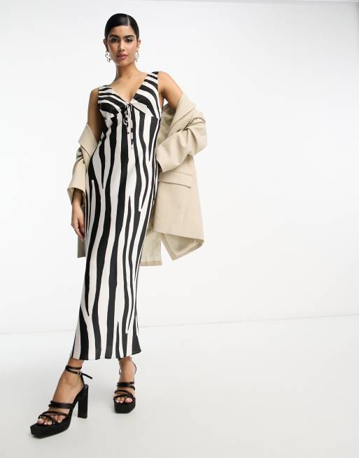 ASOS DESIGN – Satynowa sukienka midi cięta ze skosu w abstrakcyjne paski zebry z wiązaniem