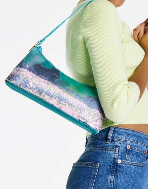 ASOS DESIGN – Satynowa torebka na ramię z metalowymi zakładkami i motywem krajobrazu