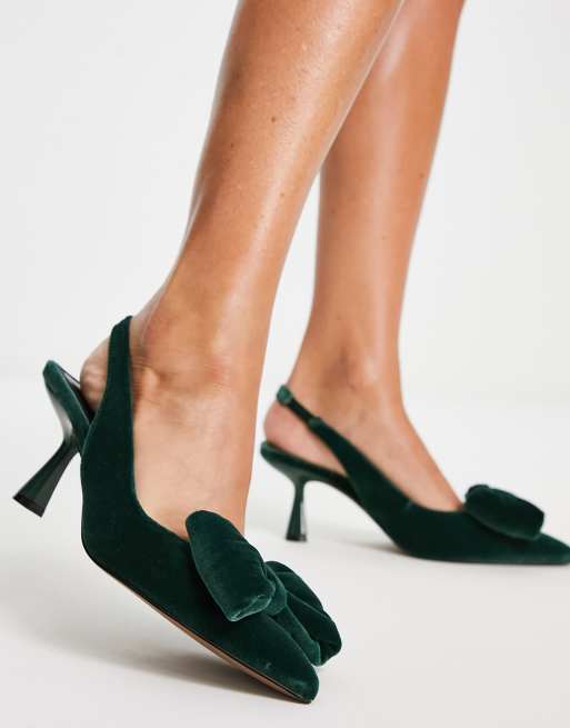 Suede pumps with slim 7cm heel and branding