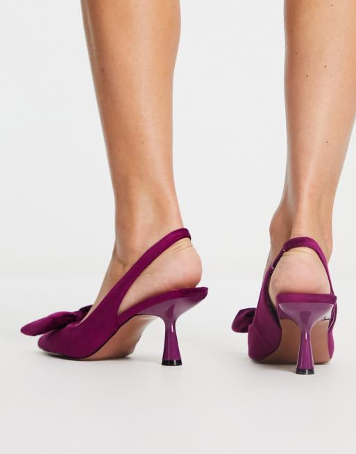 Purple heels with store bow