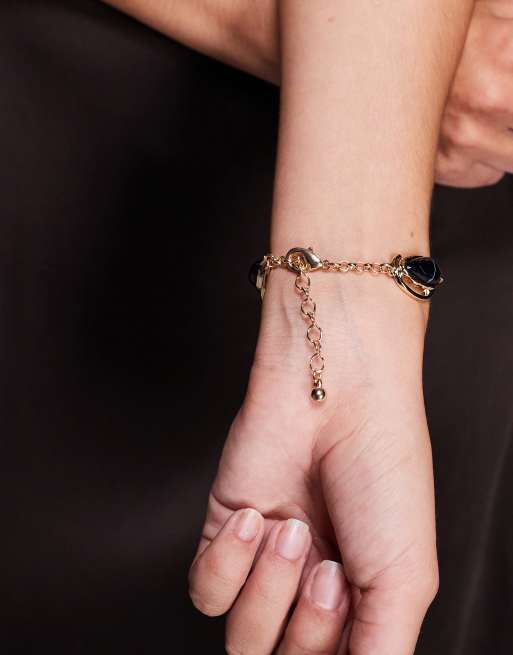 ASOS DESIGN - Schakelarmband met marineblauwe imitatie-halfedelstenen in goudkleur, 3 van 3