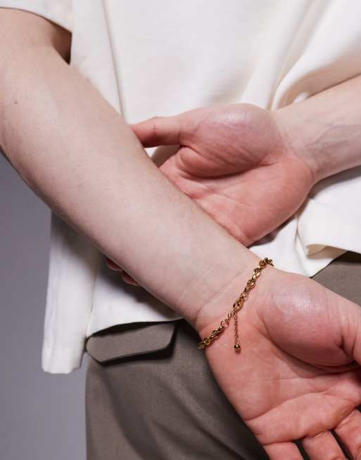 ASOS DESIGN - Schakelarmband van waterbestendig roestvrij staal in goud  , 3 van 3