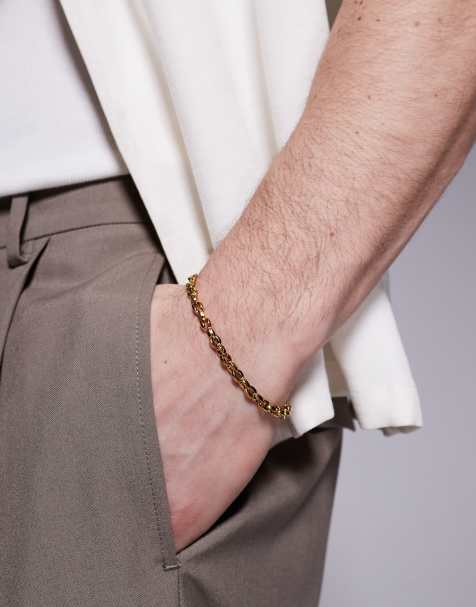 ASOS DESIGN - Schakelarmband van waterbestendig roestvrij staal in goudkleur - view 1