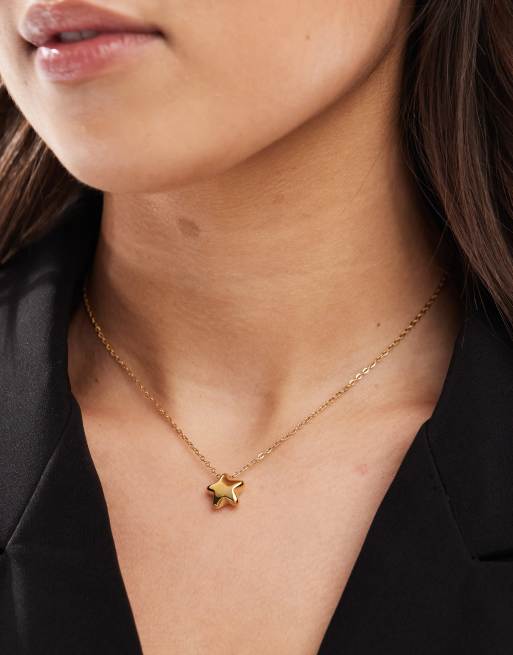 ASOS DESIGN - Schakelketting van waterbestendig roestvrij staal met klein stervormig hangertje in goudkleur, met cadeauzakje