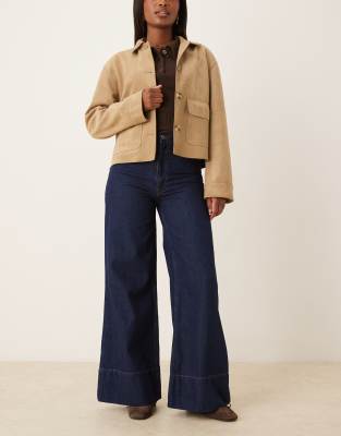 ASOS DESIGN - Schlagjeans in Rinse-Waschung mit hohem Bund und weitem Bein-Blau