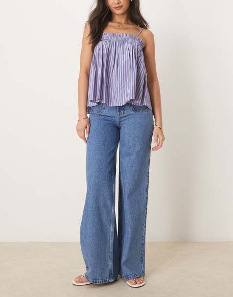 ASOS DESIGN – Schlichte Jeans in Mittelblau mit weitem Schnitt und Vordertaschen - view 1
