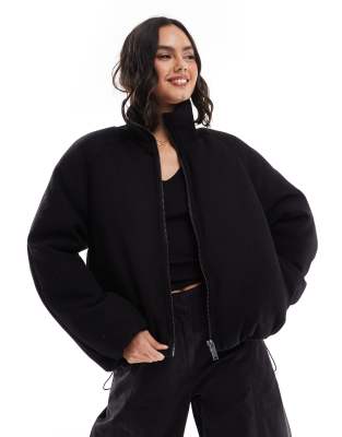 ASOS DESIGN - Schlichte Pufferjacke in Schwarz mit Strickkragen