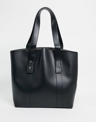 ASOS DESIGN – Schlichte Shopper-Tasche in Schwarz mit Nietenverzierung