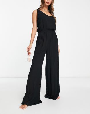 ASOS DESIGN - Schlichter Strand-Jumpsuit im Knitterlook in Schwarz mit weitem Bein