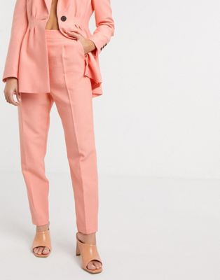 ASOS DESIGN – Schmal geschnittene Anzughose in Apricot-Rosa