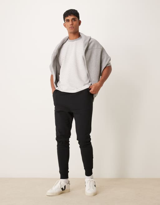 ASOS DESIGN – Schmal geschnittene Basic-Jogginghose in Schwarz, 2 von 5