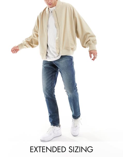 ASOS DESIGN – Schmal geschnittene Jeans in dunkelblau gefärbter Waschung - view 1