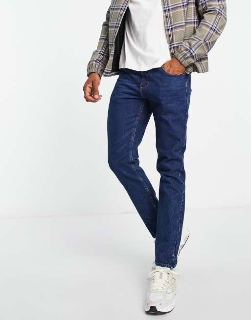 ASOS DESIGN – Schmal geschnittene Jeans in dunkelblauer Waschung