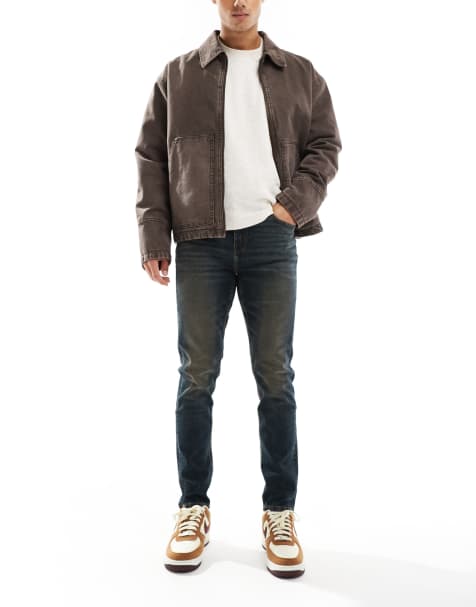 ASOS DESIGN – Schmal geschnittene Jeans in verwaschener dunkelblauer Tönung - view 1