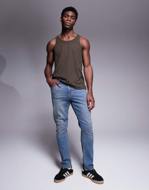 ASOS DESIGN – Schmal geschnittene Jeans in verwaschener, dunkelblauer Tönung - view 1