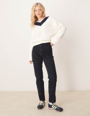 ASOS DESIGN - Schmal geschnittene Jeans mit hohem Bund und sichtbaren Ziernähten-Marineblau