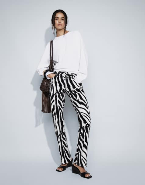 ASOS DESIGN schmal geschnittene Jeans mit Stilettoabsatz und Zebra-Print - view 1