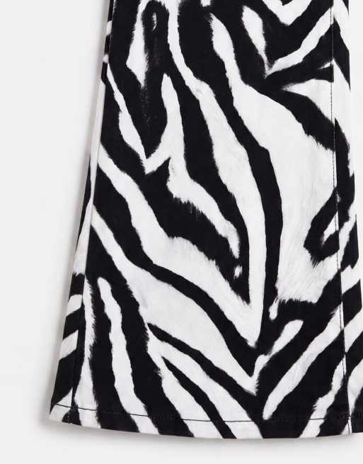 ASOS DESIGN schmal geschnittene Jeans mit Stilettoabsatz und Zebra-Print, 9 von 9