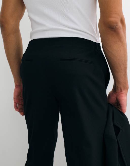ASOS DESIGN schmal geschnittene, knitterarme Anzughose in Schwarz, 5 von 5