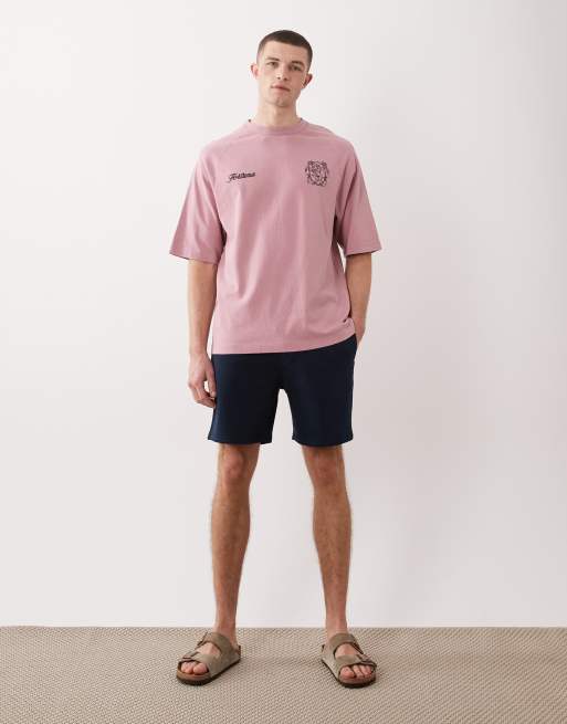 ASOS DESIGN – Schmal geschnittene, mittellange Basic-Shorts aus Jersey in Marineblau, 2 von 5