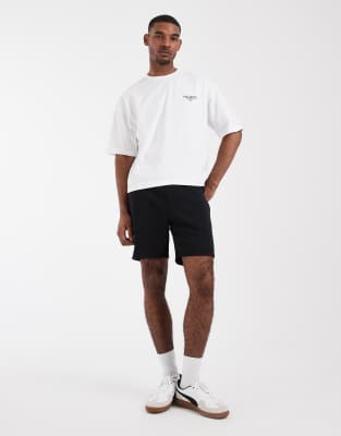 Schmal geschnittene, mittellange Basic-Shorts aus Jersey in Schwarz Schwarz L