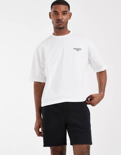 ASOS DESIGN – Schmal geschnittene, mittellange Basic-Shorts aus Jersey in Schwarz, 2 von 5