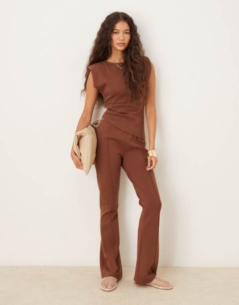 ASOS DESIGN – Schmal geschnittene Schlaghose aus Interlock-Stoff in Schokobraun mit mittelhohem Bund, Kombiteil - view 1
