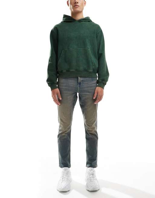 ASOS DESIGN – Schmal geschnittene Stretch-Jeans in mittelblauer Vintage-Waschung
