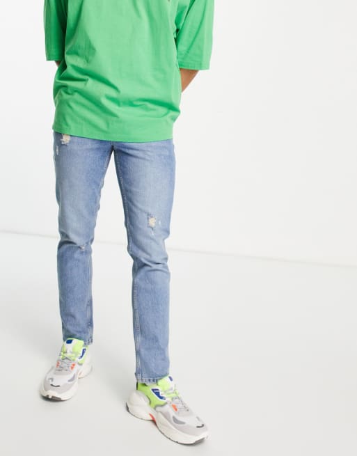 ASOS DESIGN – Schmal geschnittene Stretch-Jeans in verwaschenem Mittelblau mit Abnutzungen, 4 von 4