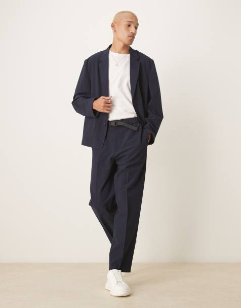 ASOS DESIGN – Schmal zulaufende Anzughose aus Seersucker in Marineblau mit Oversize-Schnitt - view 1