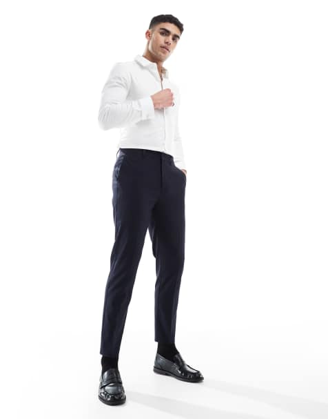 ASOS DESIGN – Schmal zulaufende Anzughose in dunklem Marineblau - view 1