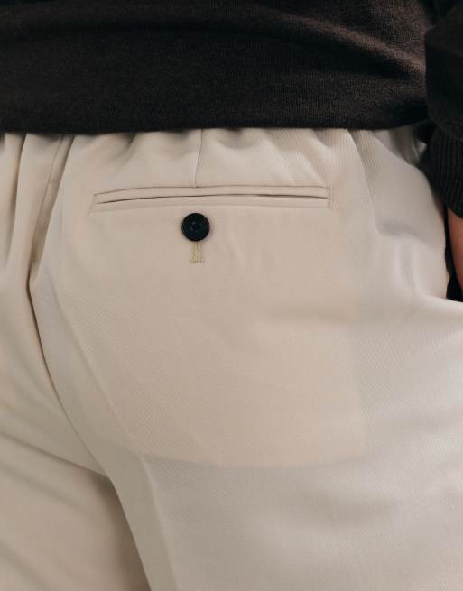ASOS DESIGN schmal zulaufende Anzughose in Ecru mit elastischem Bund und Umschlag, 4 von 5