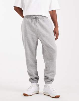 Schmal zulaufende Basic-Jogginghose in grau meliert Grau 4XL