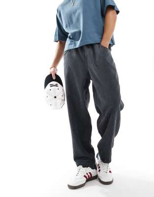ASOS DESIGN – Schmal zulaufende Cordhose in Anthrazitgrau - view 1