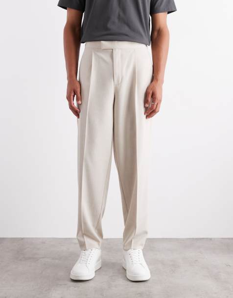 ASOS DESIGN – Schmal zulaufende, elegante Oversize-Hose in steinbeiger Leinen-Optik mit elastischem Bund - view 1
