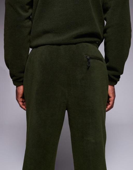 ASOS DESIGN – Schmal zulaufende Fleece-Jogginghose in Grün, Kombiteil, 4 von 5