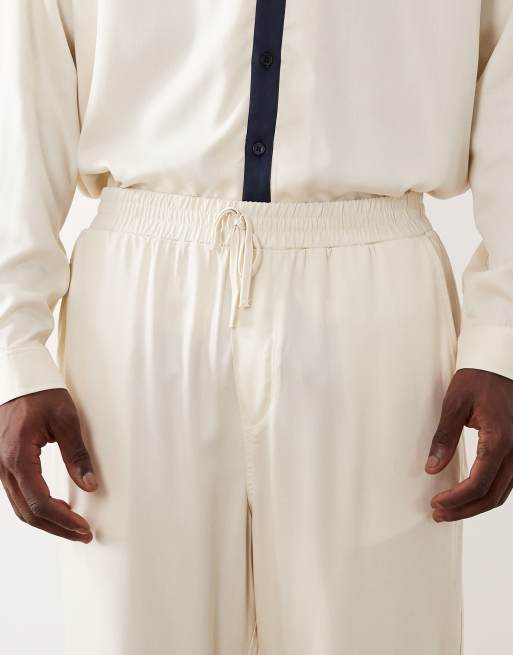 ASOS DESIGN – Schmal zulaufende Hose in Creme, Kombiteil, 4 von 5