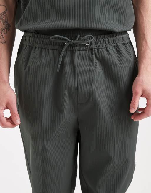 ASOS DESIGN – Schmal zulaufende Hose in Khaki, Kombiteil, 5 von 5