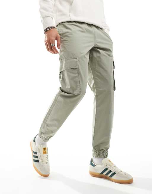 ASOS DESIGN – Schmal zulaufende Hose in Salbeigrün